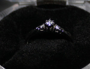 10k white gold 3 stone ring with 0.07ct diamond