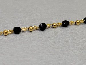 5.5" Black Bead Bracelet with 10k gold ball