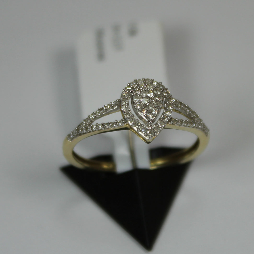 R0551: 10k 2 tone cluster for pear shaped engagement ring with 0.20ct diamond