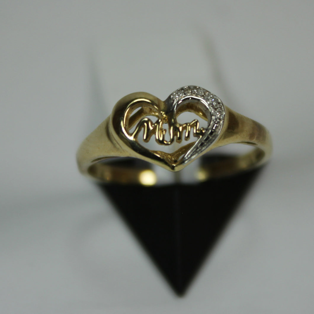R0021: 10k heart and mom diamond ring. With 0.02ct