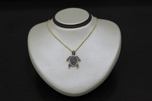 FS1008: 10k 0.40 ct TW diamond turtle pendant with box chain