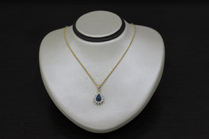 FS1009: 10k 0.27 ct TW blue diamond pendant with box chain