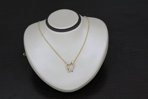 FS1018: 10k 0.02 ct TW diamond heart pendant with box chain