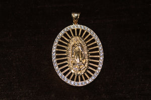 10k Mother Mary Pendant with Cubic Zirconia border.