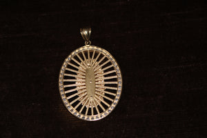 10k Mother Mary Pendant with Cubic Zirconia border.