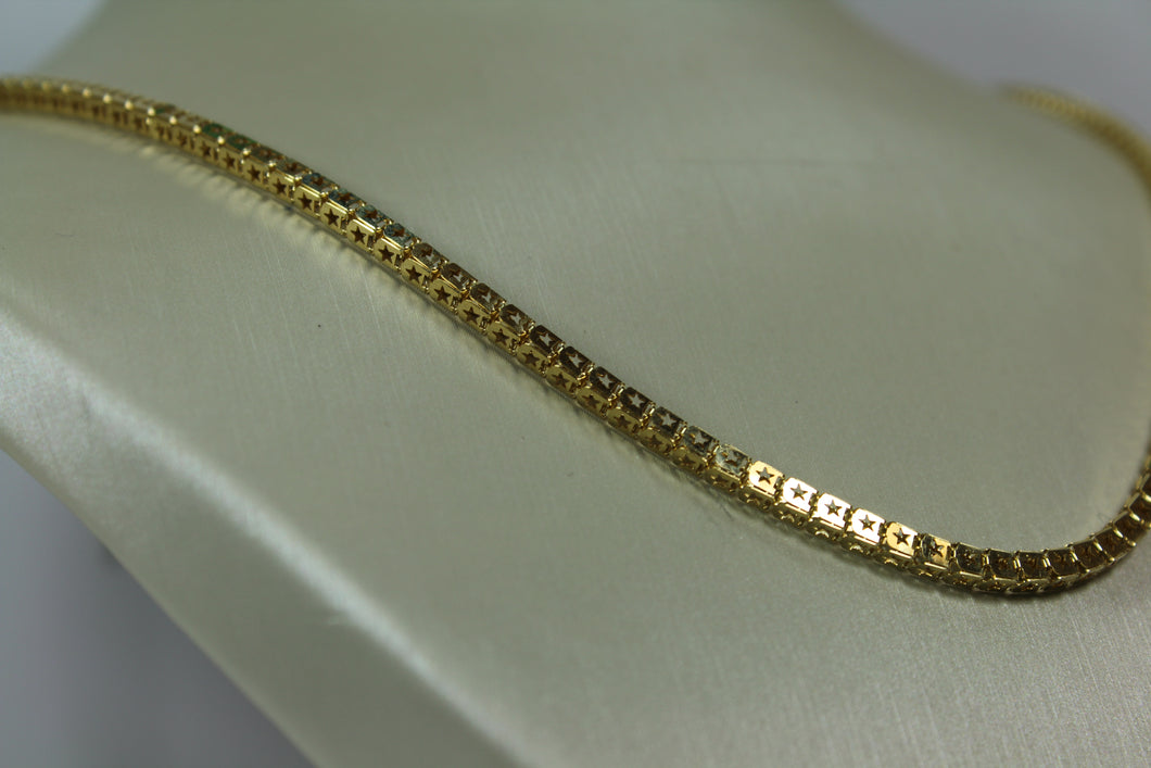 Hollowed 10k box chain with star design. 2.4mm wide 24”