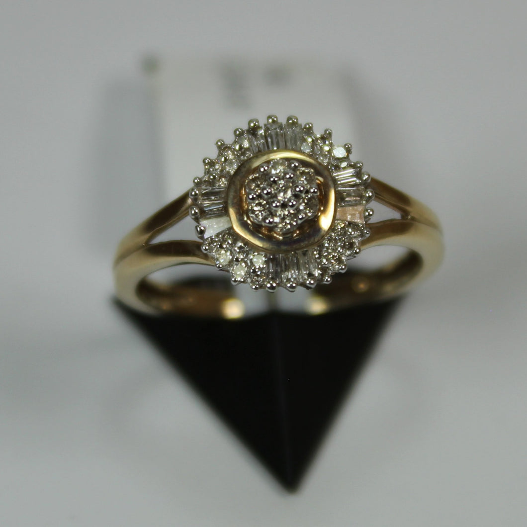 R612: A cluster of round and baguette diamond form into a stunning halo 0.34ct