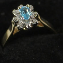 Load image into Gallery viewer, 10k ladies colour stone ring with genuine 5x3 oval Aquamarine center stone and 0.06ct diamond.