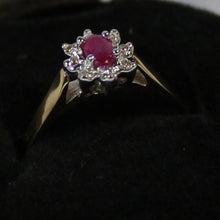 Load image into Gallery viewer, 10k ladies colour stone ring with genuine 5x3 oval Ruby center stone and 0.06ct diamond.