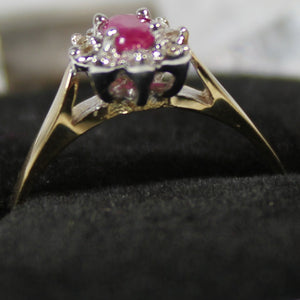 10k ladies colour stone ring with genuine 5x3 oval Ruby center stone and 0.06ct diamond.