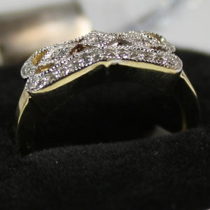 14k pattern top ring with 0.25ct diamond.