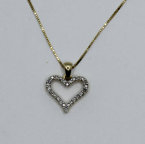 10k 0.09 ct TW diamond heart pendant with 18" box chain