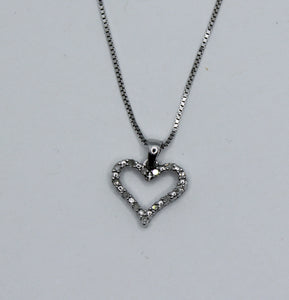 10k 0.09 ct TW diamond heart pendant with 18" box chain
