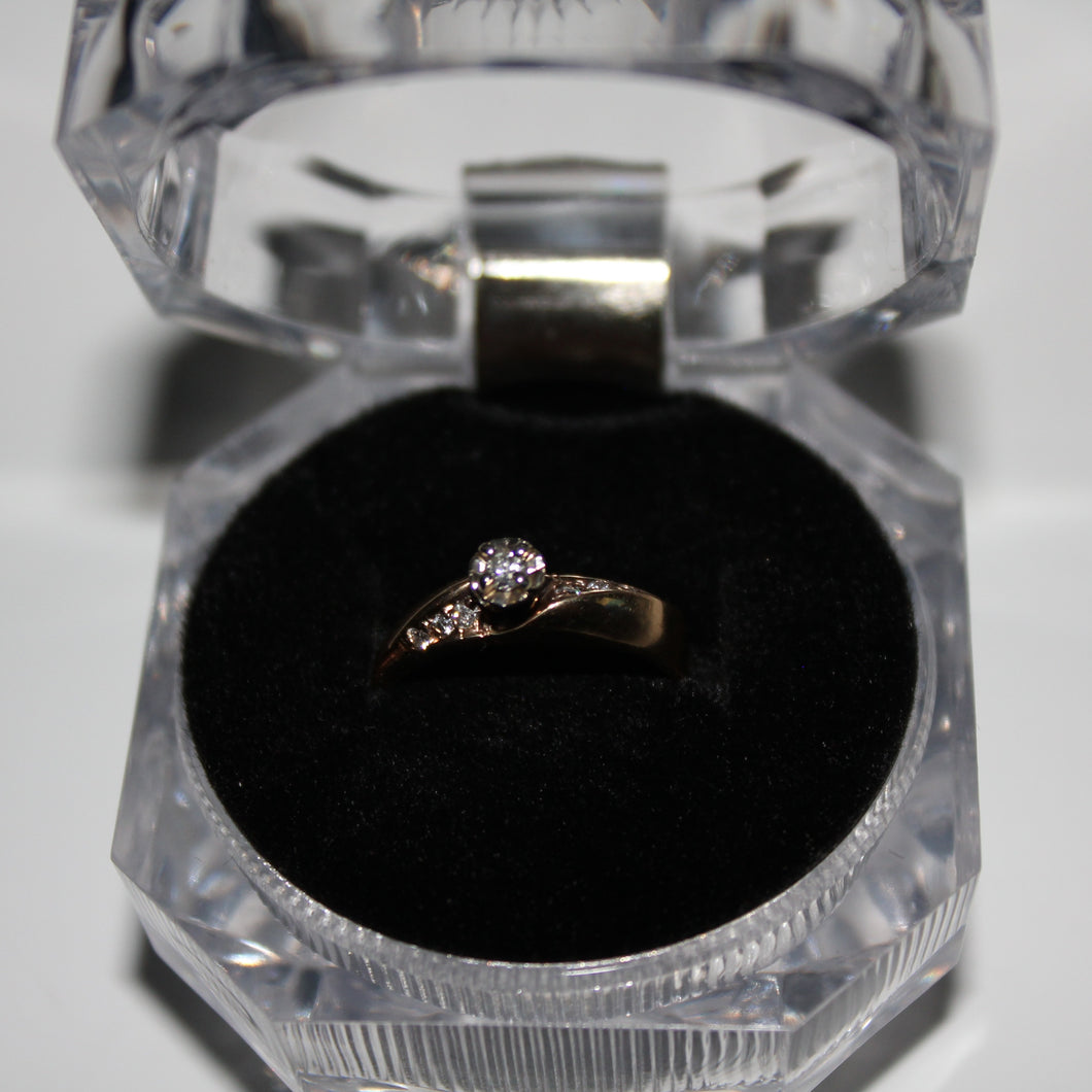 14k engagement / promise ring with 0.14ct diamond SI2